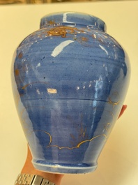 A rare pair of Japanese gilt-decorated blue-ground vases, Edo, late 17th C.