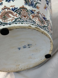 A large Dutch Delft cashmere palette vase with a phoenix and birds among flowers, ca. 1700