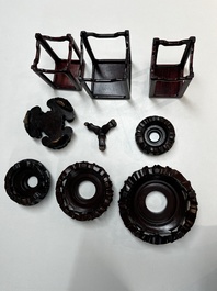 A collection of 25 Chinese wooden stands, 19/20th C.