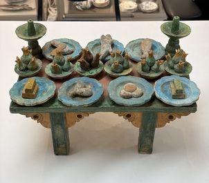 A Chinese sancai-glazed pottery model of an offering table, Ming