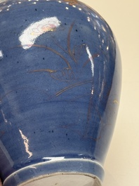 A rare pair of Japanese gilt-decorated blue-ground vases, Edo, late 17th C.