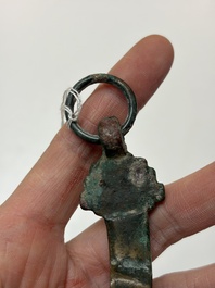 A Chinese archaic bronze fitting and a spearhead, Western Zhou