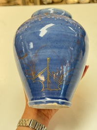 A rare pair of Japanese gilt-decorated blue-ground vases, Edo, late 17th C.