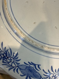 A massive Japanese blue and white 'Dragon among Sea Waves' dish, probably Arita, Meiji, 19th C.