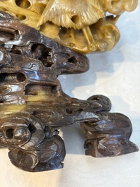 A fine Chinese carved soapstone 'Dragons among Clouds' group and a 'Phoenixes and Cranes' group, 20th C.