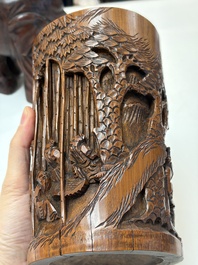 A group of 11 Chinese carved bamboo and wooden works, 19/20th C.