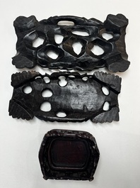 A collection of 25 Chinese wooden stands, 19/20th C.