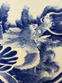 A massive Japanese blue and white 'Dragon among Sea Waves' dish, probably Arita, Meiji, 19th C.