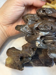 A fine Chinese carved soapstone 'Dragons among Clouds' group and a 'Phoenixes and Cranes' group, 20th C.