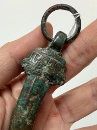A Chinese archaic bronze fitting and a spearhead, Western Zhou