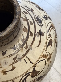 A large Chinese Cizhou ware slip-glazed wine jar, Ming