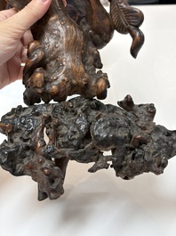 A group of 11 Chinese carved bamboo and wooden works, 19/20th C.