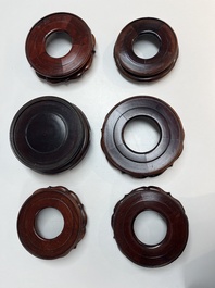 A collection of 20 Chinese wooden stands, 19/20th C.