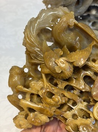 A fine Chinese carved soapstone 'Dragons among Clouds' group and a 'Phoenixes and Cranes' group, 20th C.