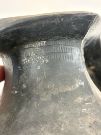 Two Chinese Sichuan black burnished pottery amphoras, Han