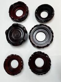 A collection of 20 Chinese wooden stands, 19/20th C.