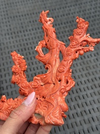 A Chinese carved red coral 'Goddess and Boy' group, 19/20th C.