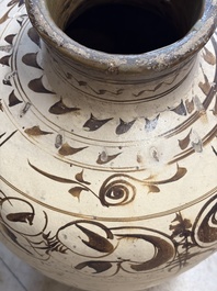 A large Chinese Cizhou ware slip-glazed wine jar, Ming
