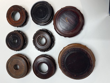 A collection of 20 Chinese wooden stands, 19/20th C.