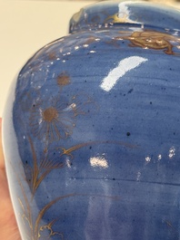 A rare pair of Japanese gilt-decorated blue-ground vases, Edo, late 17th C.
