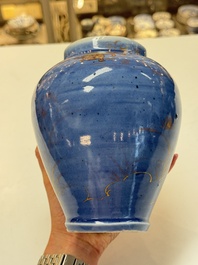 A rare pair of Japanese gilt-decorated blue-ground vases, Edo, late 17th C.