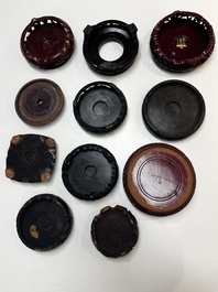 A collection of 111 Chinese wooden stands, 19/20th C.