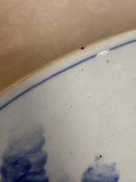 A massive Japanese blue and white 'Dragon among Sea Waves' dish, probably Arita, Meiji, 19th C.