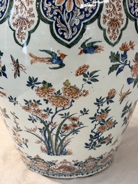 A large Dutch Delft cashmere palette vase with a phoenix and birds among flowers, ca. 1700