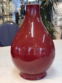 A Chinese flamb&eacute;-glazed vase and a jar with wooden cover, 19th C.