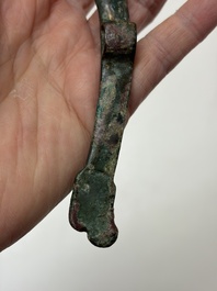A Chinese archaic bronze fitting and a spearhead, Western Zhou