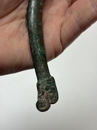 A Chinese archaic bronze fitting and a spearhead, Western Zhou