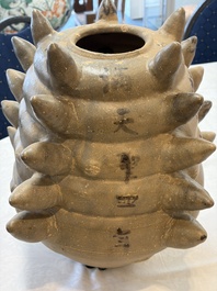 A large inscribed Chinese spiked funerary jar and cover, Northern Song, dated 1026