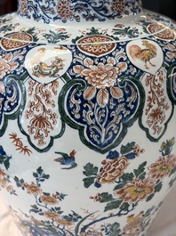 A large Dutch Delft cashmere palette vase with a phoenix and birds among flowers, ca. 1700