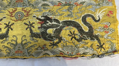 Two Chinese yellow-ground kesi silk 'Dragon' panels, late Ming