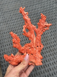 A Chinese carved red coral 'Goddess and Boy' group, 19/20th C.