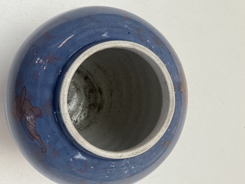 A rare pair of Japanese gilt-decorated blue-ground vases, Edo, late 17th C.