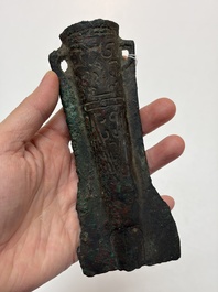 A Chinese archaic bronze fitting and a spearhead, Western Zhou