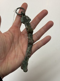A Chinese archaic bronze fitting and a spearhead, Western Zhou