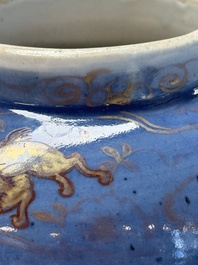 A rare pair of Japanese gilt-decorated blue-ground vases, Edo, late 17th C.