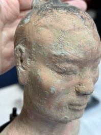 A Chinese cold-painted pottery stick man figure, Han