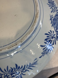 A massive Japanese blue and white 'Dragon among Sea Waves' dish, probably Arita, Meiji, 19th C.