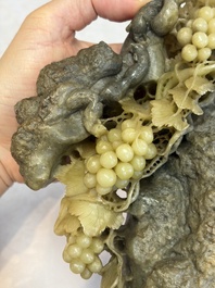 A fine Chinese carved soapstone 'Squirrels and Grapes' group and a 'Phoenixes among Peonies' group, 20th C.