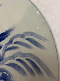 A massive Japanese blue and white 'Dragon among Sea Waves' dish, probably Arita, Meiji, 19th C.