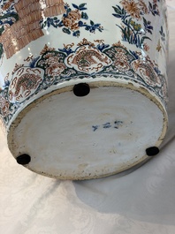 A large Dutch Delft cashmere palette vase with a phoenix and birds among flowers, ca. 1700