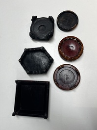 A collection of 111 Chinese wooden stands, 19/20th C.