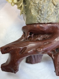 A fine Chinese carved soapstone 'Squirrels and Grapes' group and a 'Phoenixes among Peonies' group, 20th C.