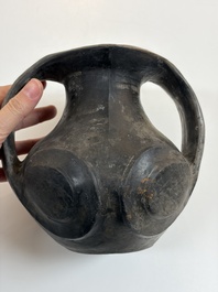 Two Chinese Sichuan black burnished pottery amphoras, Han