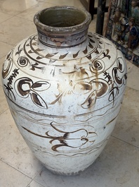 A large Chinese Cizhou ware slip-glazed wine jar, Ming