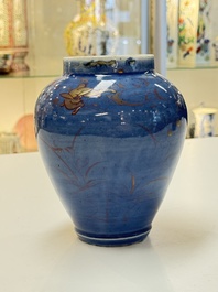 A rare pair of Japanese gilt-decorated blue-ground vases, Edo, late 17th C.