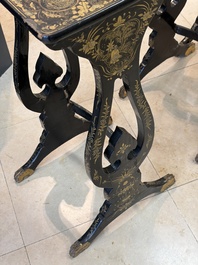 A set of three Chinese Canton gilt-lacquered nesting tables with narrative design, 19th C.